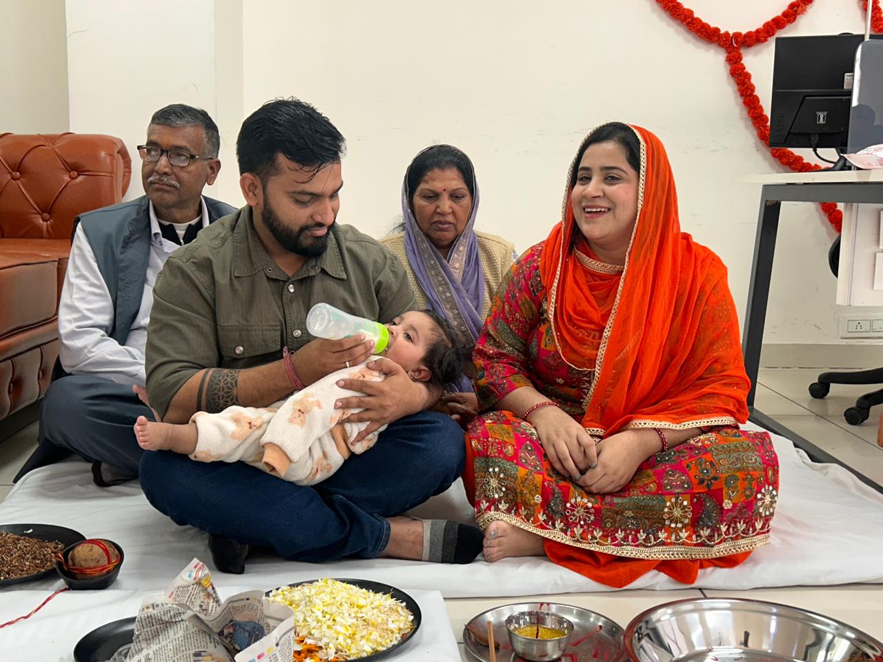 TechCadd Mohali team performing havan and pooja ceremony with family members for peace, positivity, and success at the workplace